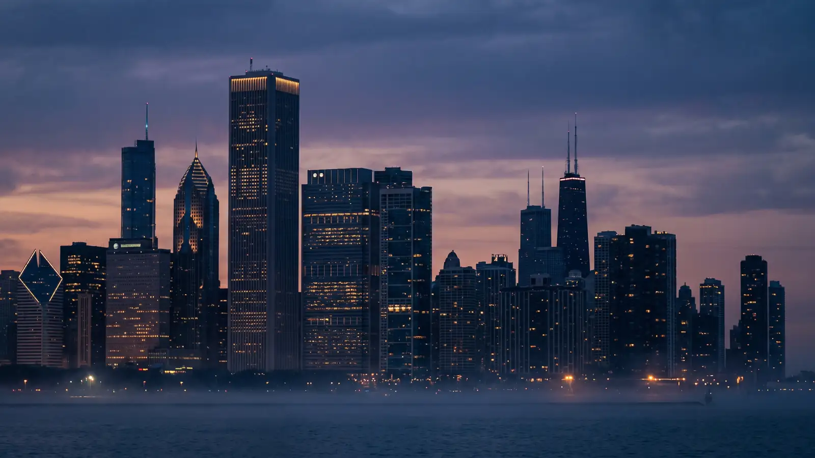 The Chicago skyline at dusk, seen from across the lake.